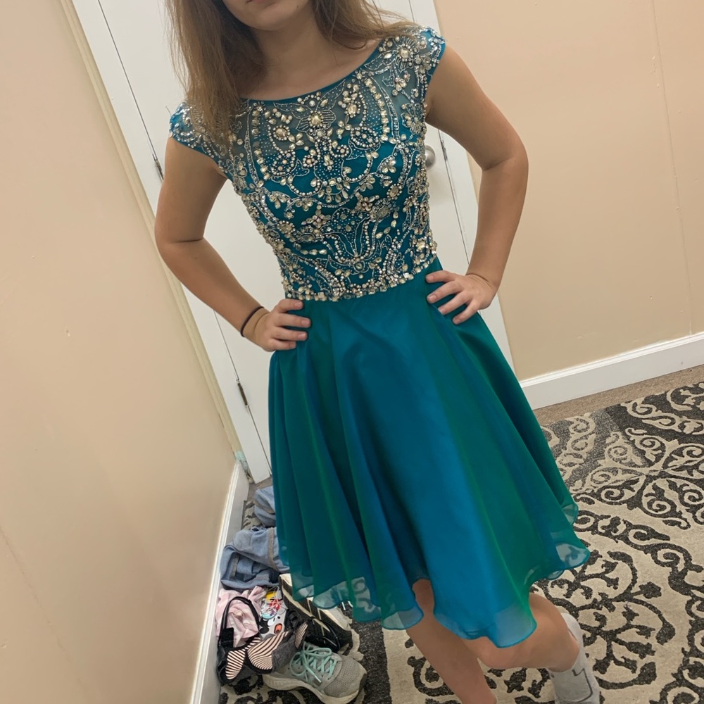 Sherri Hill size 4. Has been worn a few times.